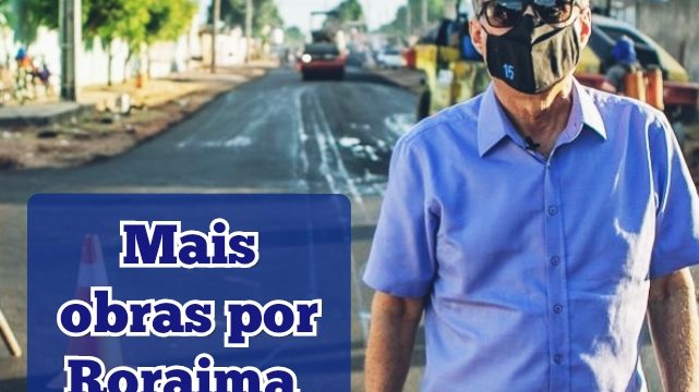 Jucá de Máscara anda em via com obra de asfalto em Boa Vista Roraima com máquinas ao fundo